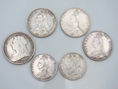 An 1893 Victorian silver crown, a George IV 1824 s