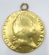 A 22ct gold George III mounted spade guinea, worn