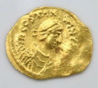 A circa sixth century tremissis gold coin, 18mm at