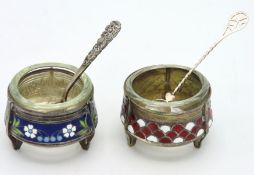Two white metal & enamelled glass lined salts, pos