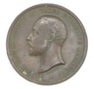 An 1886 Colonial & Indian Exhibition medal, London
