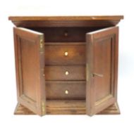 A 19thC. oak writers cabinet with bone handles, 33