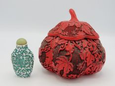 A mid 20thC. Chinese lacquer style gourd shaped li