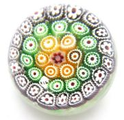 A glass paperweight with numbered/dated cane '1846