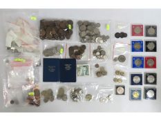 A selection of commemorative crowns, UK bank notes