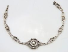 An art deco white & yellow metal bracelet, lacking