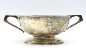 A silver art deco footed trophy, possibly American