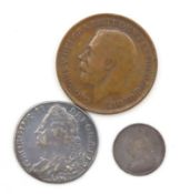 A George II 1745 coin twinned with a 1899 silver t