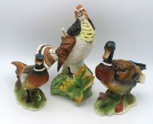 Three pottery models of a Ruffled Grouse, a Pheasa