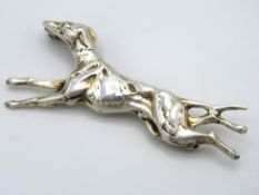 A silver sighthound brooch, 51.25mm wide, 7g