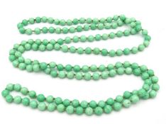 A vintage flapper style jade necklace, 1500mm long