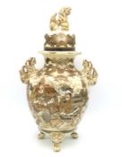 An early 20thC. Japanese Satsuma ware lidded vase with figurative decor, 375mm tall