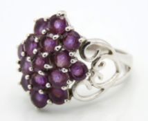 A 9ct white gold ring set with amethyst, size K/L,