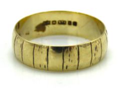 A 9ct gold band, size M/N, 2.3g