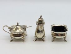 A 1932 Birmingham silver condiment set by Henry Cl