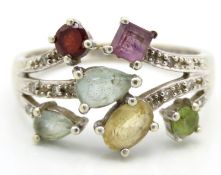 A 9ct white gold ring set with diamond, amethyst,