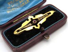 A cased 9ct gold brooch set with pearl & garnet, 4
