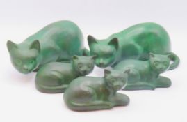 Five verdigris bronze style cats, two adults & thr