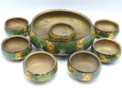A gilt metal lined Asian papier-mache bowl with si