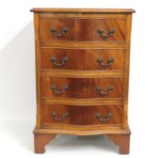 A serpentine fronted mahogany chest of four drawer