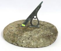 A reconstituted stone sun dial, 410mm wide x 255mm