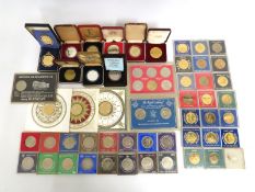 A collection of various crowns including some proo