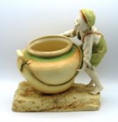 An Austrian Amphora porcelain figure of boy with l