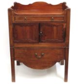 A Georgian mahogany bedside cabinet, 900mm tall x
