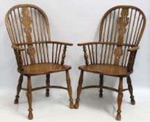A pair of elm & ash Windsor chairs with crinoline