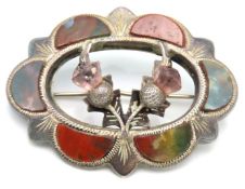 A sterling silver Scottish brooch with thistle dec