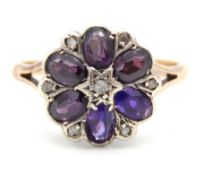 A 9ct rose gold amethyst & diamond ring of floral