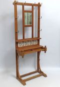A c.1900 oak hall stand with mirror & key box, lac