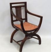 A walnut Edwardian Savonarola style chair, 915mm h