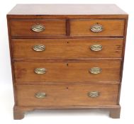 A George III mahogany chest of drawers with brass