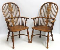 A pair of elm & ash Windsor chairs with crinoline