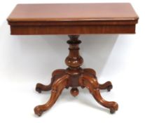 A Victorian mahogany card table with green circula