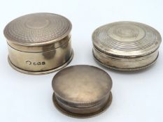A 1918 Birmingham silver box with machined décor twinned with two other silver boxes, 64.6g