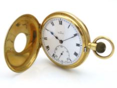An 18ct gold top wind half hunter pocket watch, mo