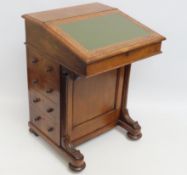 A late Victorian oak Davenport with four drawers,