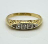 An antique 18ct gold five stone ring with platinum
