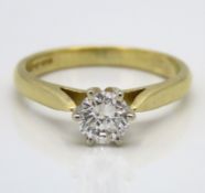 An 18ct gold diamond solitaire with Tiffany style