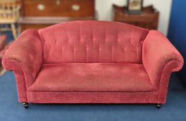 An antique style Chesterfield sofa, later reuphols