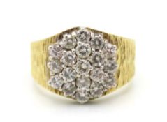 An 18ct gold diamond cluster ring with bark effect