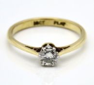 An 18ct gold diamond solitaire ring with platinum set set diamond of approx. 0.25ct, estimated colou