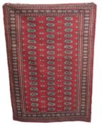 A silk & wool Bokhara rug, 1780mm x 1220mm