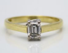 An 18ct gold diamond solitaire ring set with appro