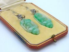 A pair of early 20thC. Chinese carved jade drop ea