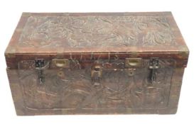 A 19thC. carved Chinese camphor wood chest with la