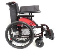 An Outlander All Terrain wheelchair, presents as n