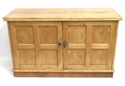 An antique pine low level cupboard, 1242mm wide x